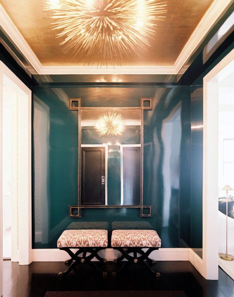 Now this is a strong competition of what's more gorgeous, the gold ceiling or the teal lacquered walls.