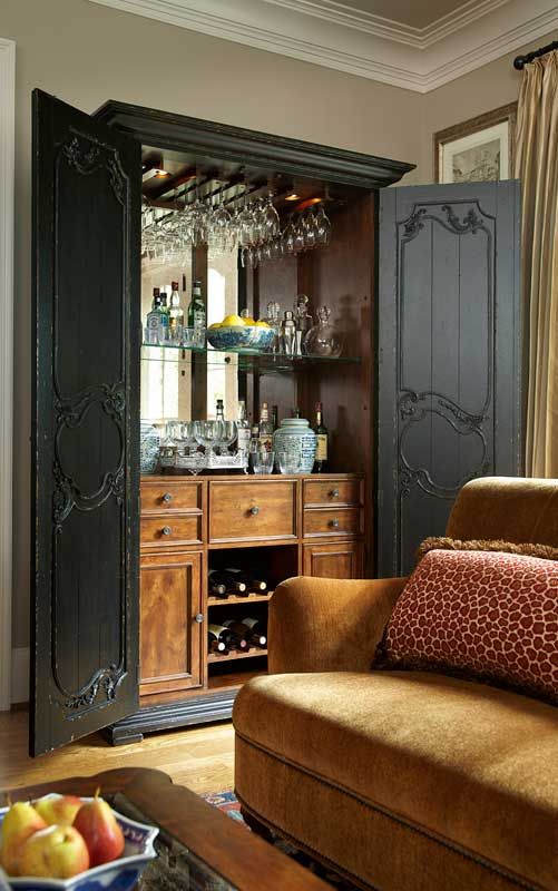 have an old armoire? turn it into a bar. talk about a conversation piece