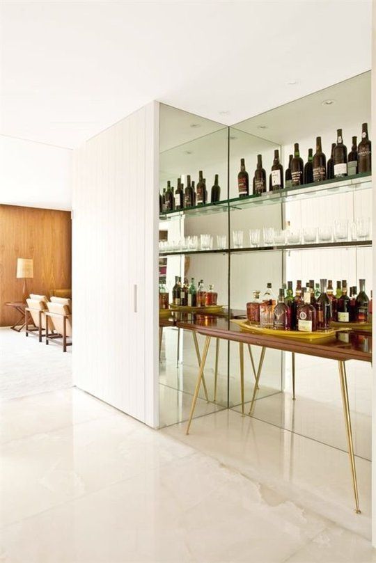 I think mirrors just fit perfectly in a bar . they reflect the crystal and bottles beautifully. and they help you see if your lipstick is smeared