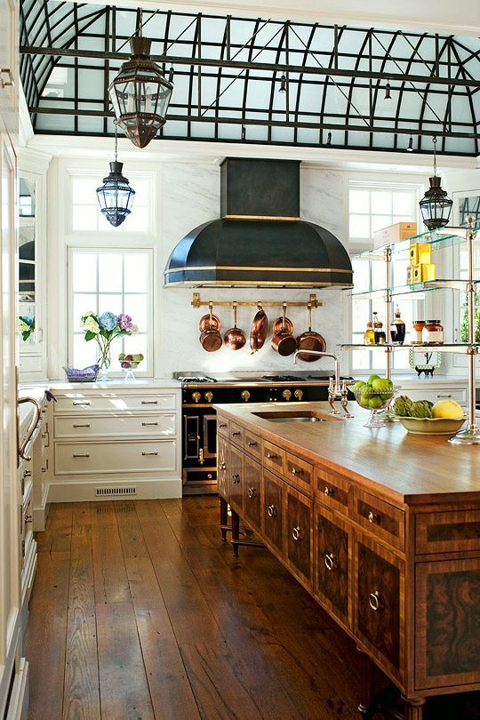Could this kitchen have any more character?!!! between the greenhouse ceiling, the hood that mimics the shape of the ceiling and The shelves that are asking for some sweet treats to grace its perch