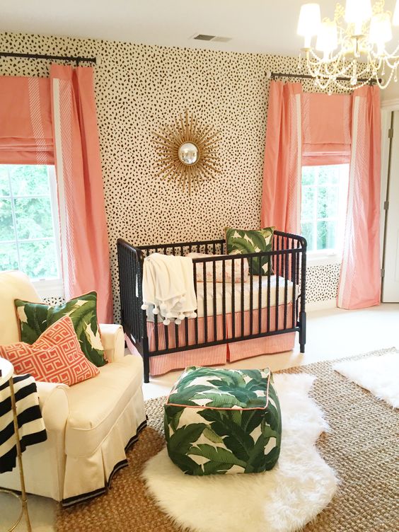 What a sweet preppy, feminine space for one special baby. I love the peach and banana leaf color combo.