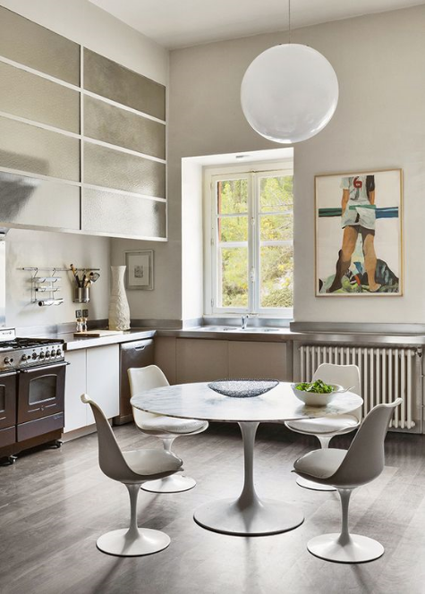 To think the table and chairs were found in an 18th century attic of an old barn, via Knoll
