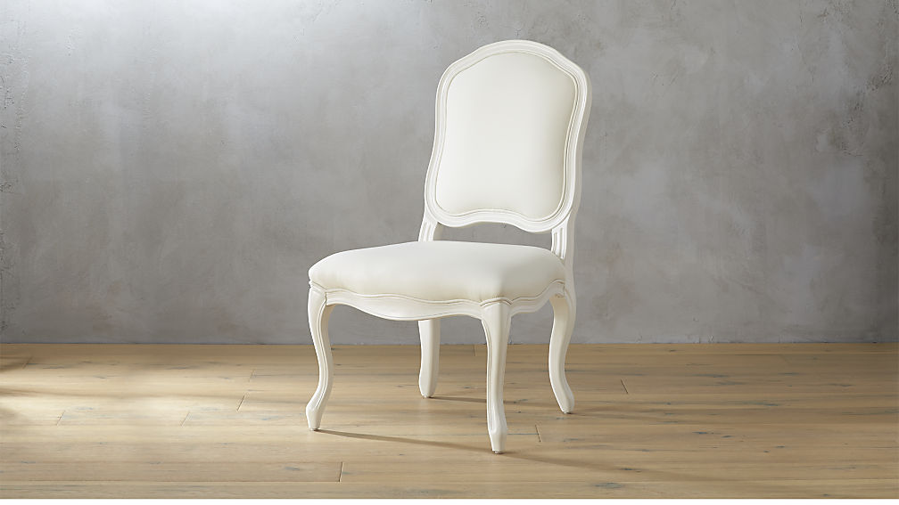 They used a similar chair to this in their last manhattan home in their dining room. Upholster it in vinyl and use it everyday 