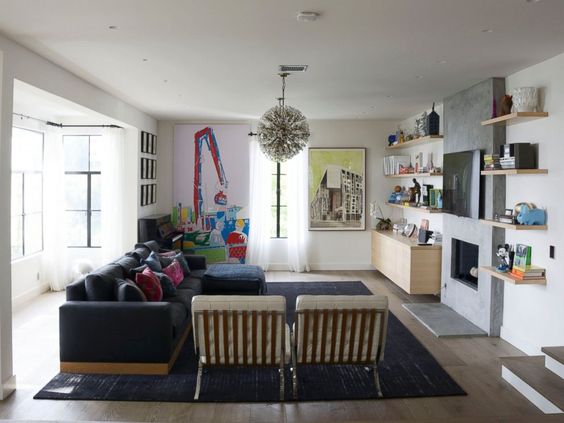 I love this light fixture and the concrete fireplace 