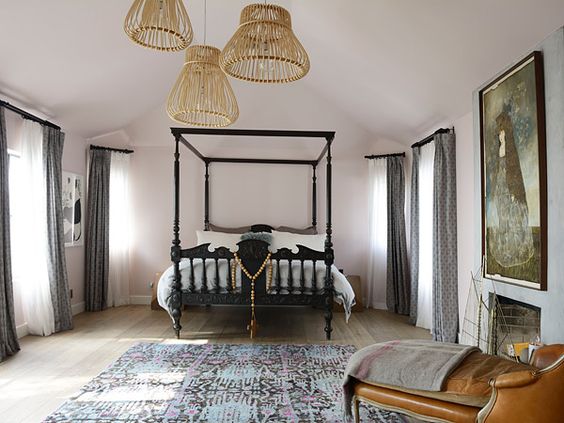 The Master bedroom. I love the colors of the rug with the leather chaise 