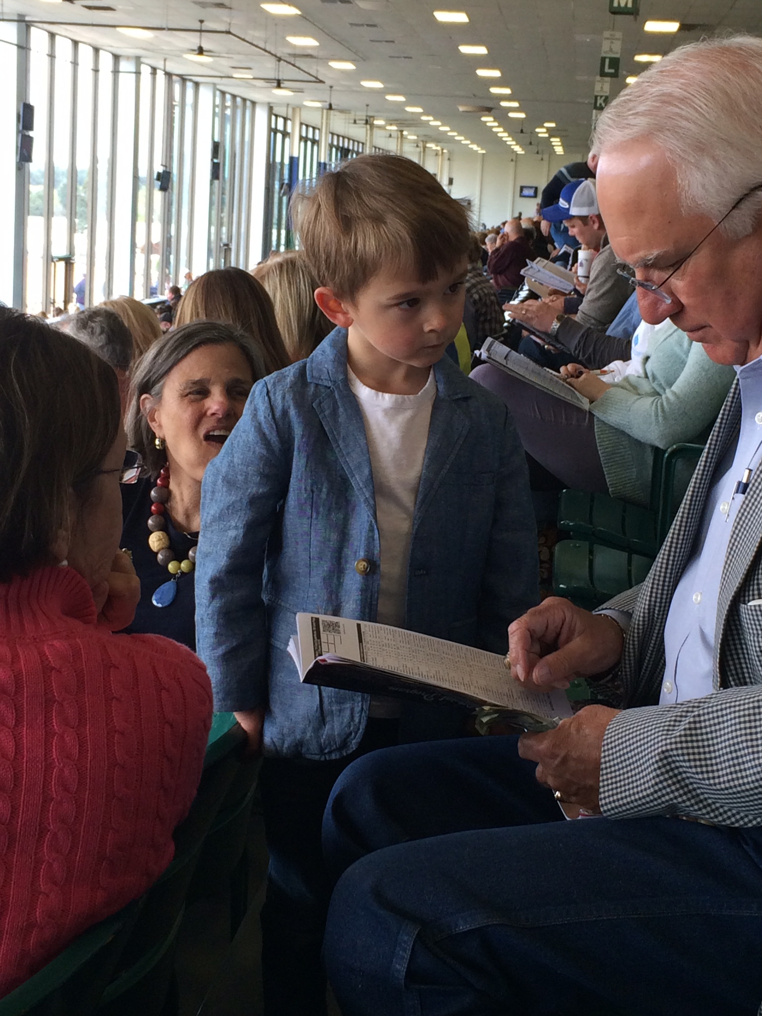 I'm just sayin', there's a chance asher might become a bookie when he grows up. he was even approaching people he didn't know asking who they were betting on.