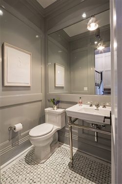 a simple, serene powder room 