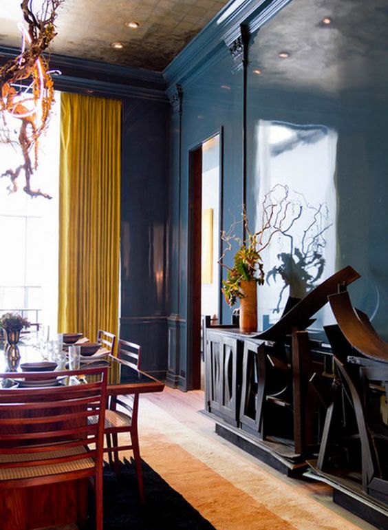another unique blue room. Note the drapery color, it's gaining more and more popularity lately in decor 