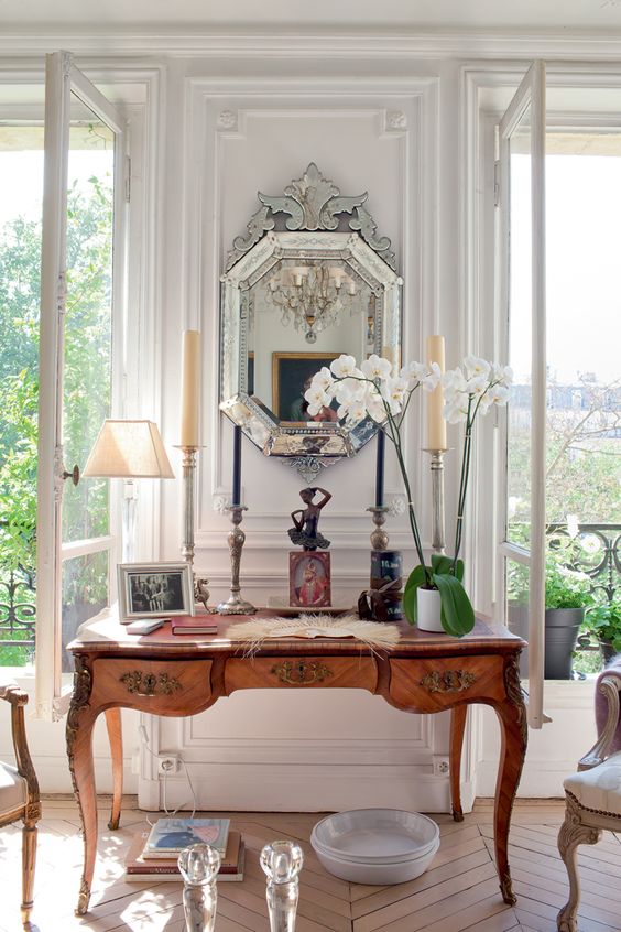 just look at those windows! Could you imagine?!! I just wish the desk was centered on that wall though