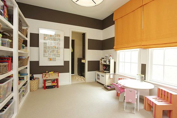 great combination of brown, white, and orange. I would have put these orange baskets on the shelves to accentuate the orange window treatment even more. Side note: the baskets are so sturdy!!