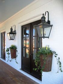 loving the mounted planters and lanterns 