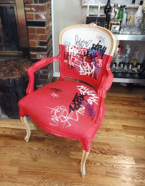 note the juxtaposition of the traditional lines of the chair with the pink fabric and writing.....yet it works!