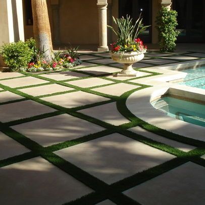 By having larger pavers, it gives the feeling of a larger space. 