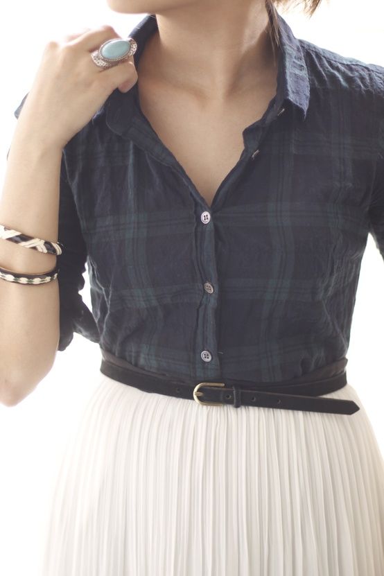  A perfect way to wear a pleated skirt in the Fall paired with a plaid shirt. 