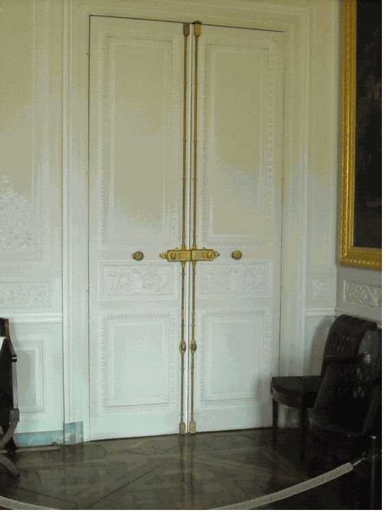 just look at all that moulding paired with the gold cremone bolts . Marie Antionette had great taste.