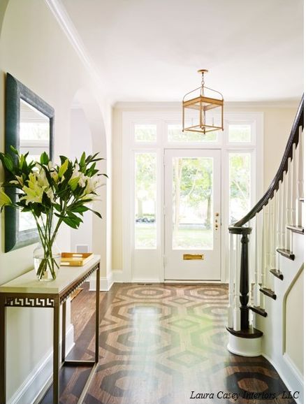 Not quite ready to paint your floors? Try a two tone stain for a more subtle approach. Via 