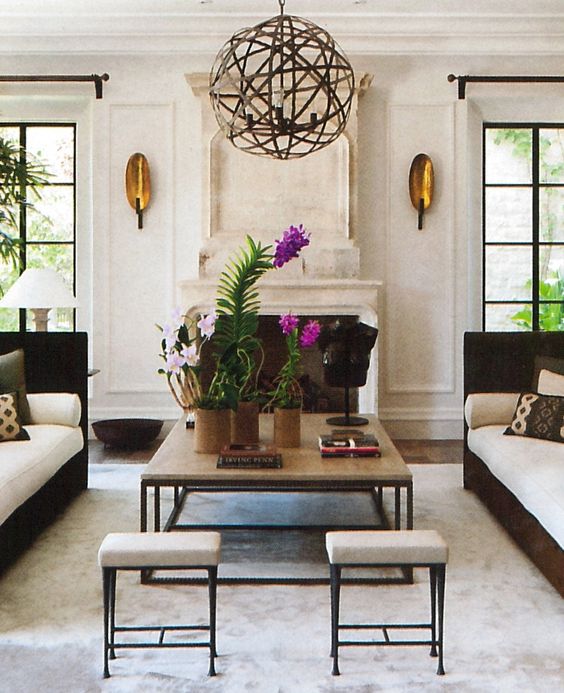 Lusting over those sconces. Via Architectural Digest 