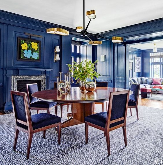 anytime you can fit a round or oval table in your room, do it. You need more space to do it, but it instantly makes your room stand out
