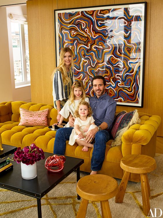 How precious are their daughters, Evie and Lydia. I also can't get over that mustard velvet vintage edward Wormly sofa.