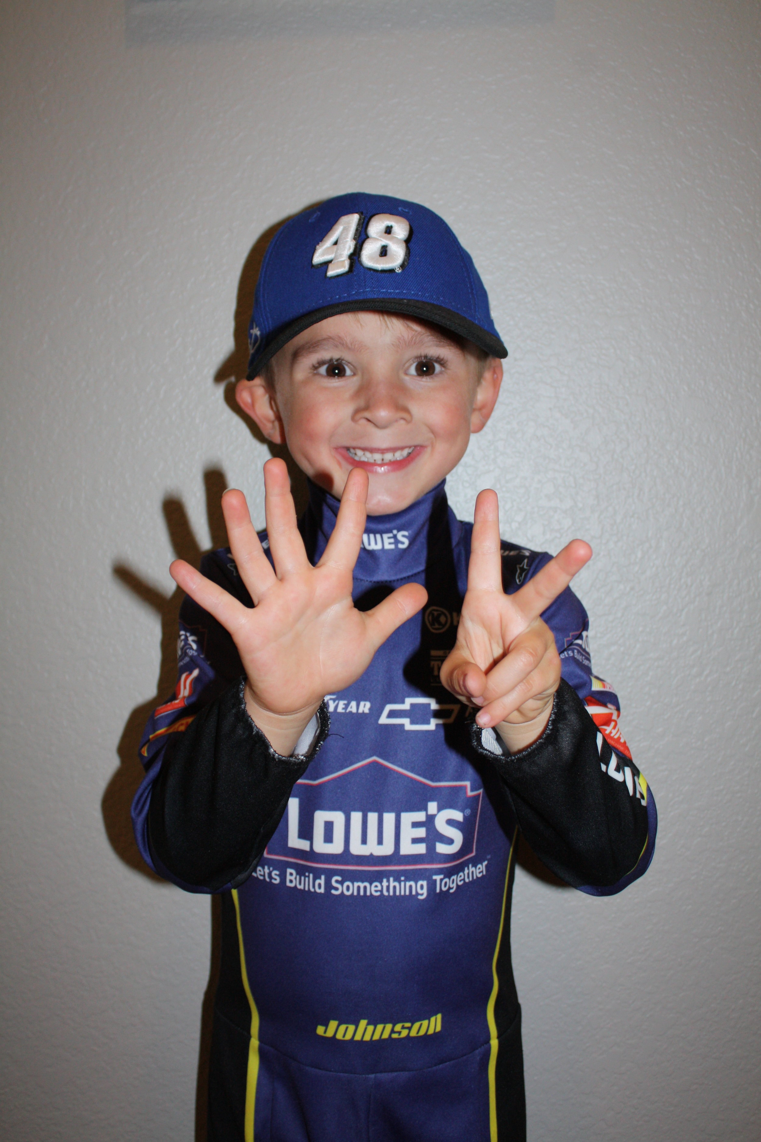 Our little Asher as Jimmie for Halloween, wishing for his 7th championship