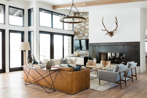 Can we just stop and take a moment to look at that fireplace! I also love the geometric lines of the sofa table. via studio McGee