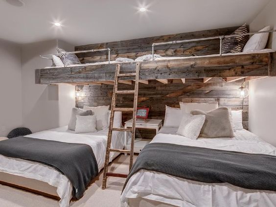 Bunk rooms are a great solution for sleeping lots of people in a mountain home. The more the merrier I say. You could rent this house ! 