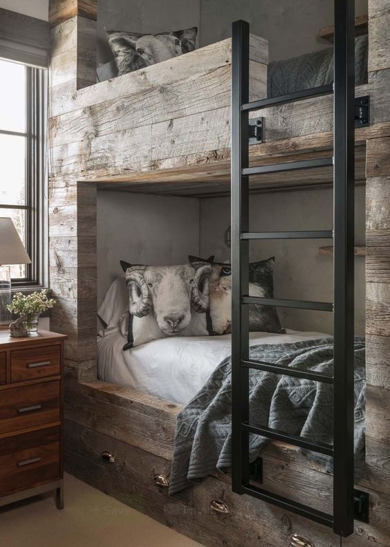 Oh my! All I can look at is that ram looking back at me. But this one photo is a perfect example of mixing materials. Two different colors of wood (in the bunk beds and nightstands), mixing metals (drawer hardware and ladder) and having a bit of white to pop.