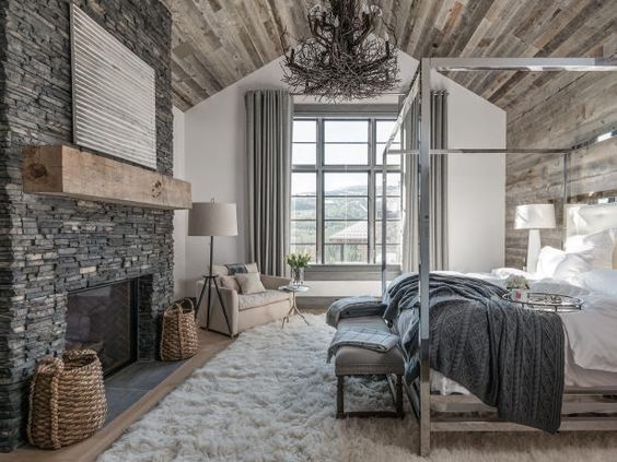 What an elegant feminine modern mountain bedroom .