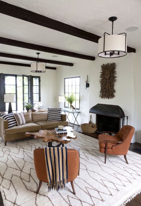 I've been obsessing over white rooms with beams lately 