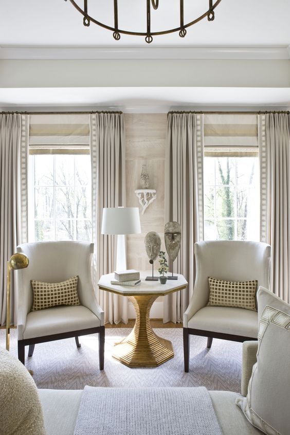 a monochromatic room that plays up texture and art