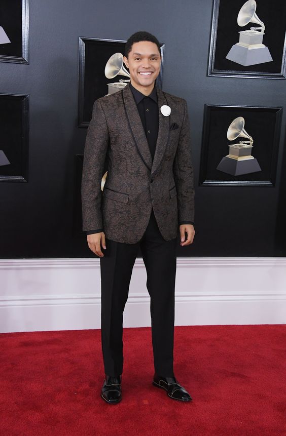 Give me a men's twead any day and I'll fall in love. It's such a classic, and not SURPRISING Trevor Noah selected it. He's wearing Dolce & Gabbana and Christian Louboutin shoes