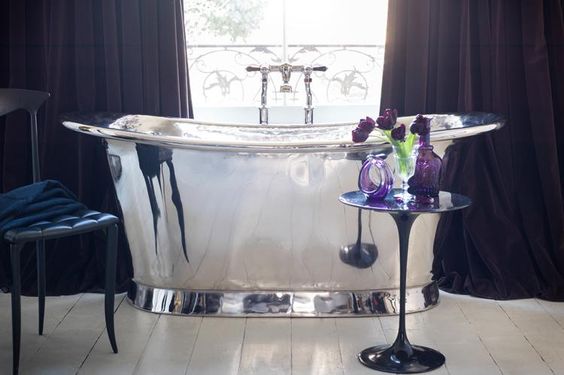 I NEED TO START SHOPPING FOR A DRINK TABLE TO ACCOMPANY MY TUB. 