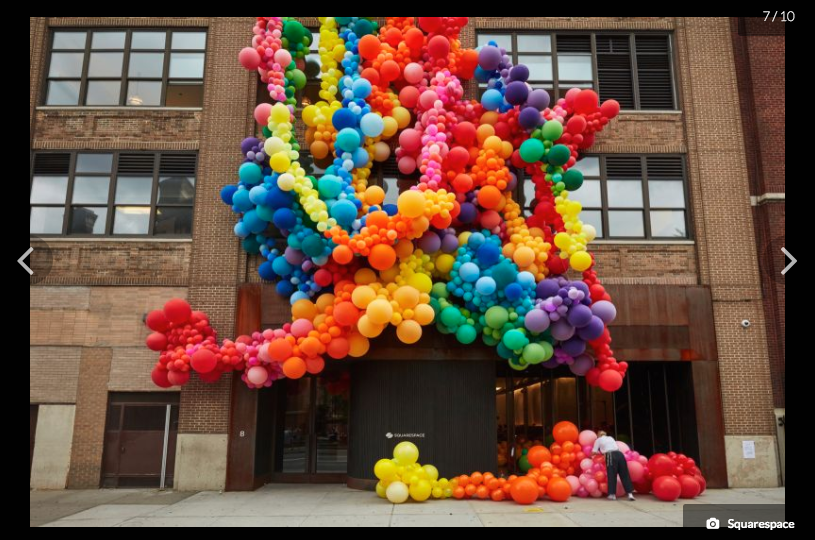 I like how on some of her installations it's as if the balloons are just spilling out of the buildings, busting at the seams. 