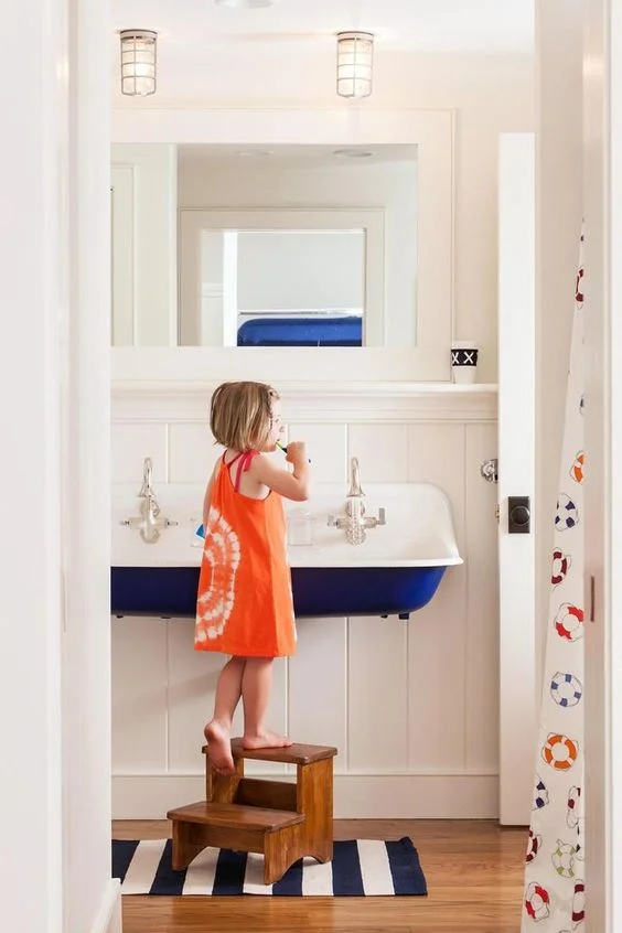 I can't handle how cute kids look just standing at this sink! 