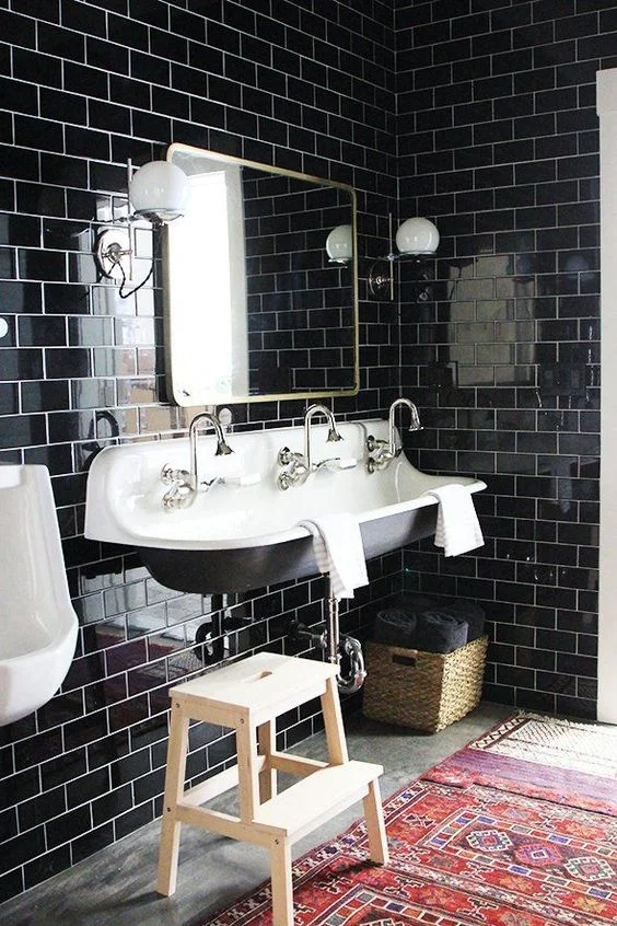Oh, my favorite color, black. It too is really coming back in the form of black tiles for bathrooms. For now, I'd stick to white toilets though. via Pop Sugar