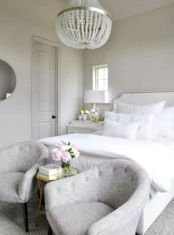 I like the shape of these small chairs and also the shape of the nightstands. All this room needs is some simple window treatments and it's ready to go. 