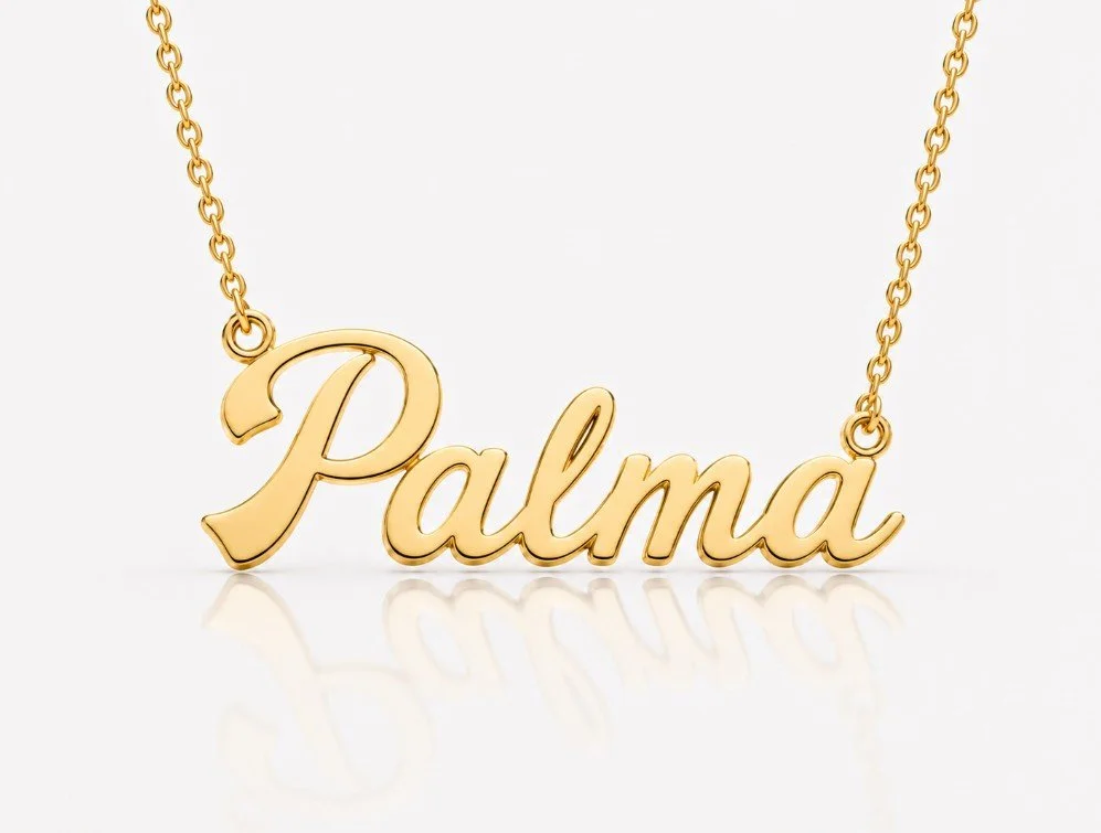 Gold necklace nameplate, pendant spelling "Palma" in cursive