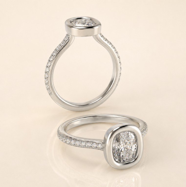 Two silver rings with large diamonds, one upright and one lying flat, featuring pave-set diamonds and cushion-cut center stones.
