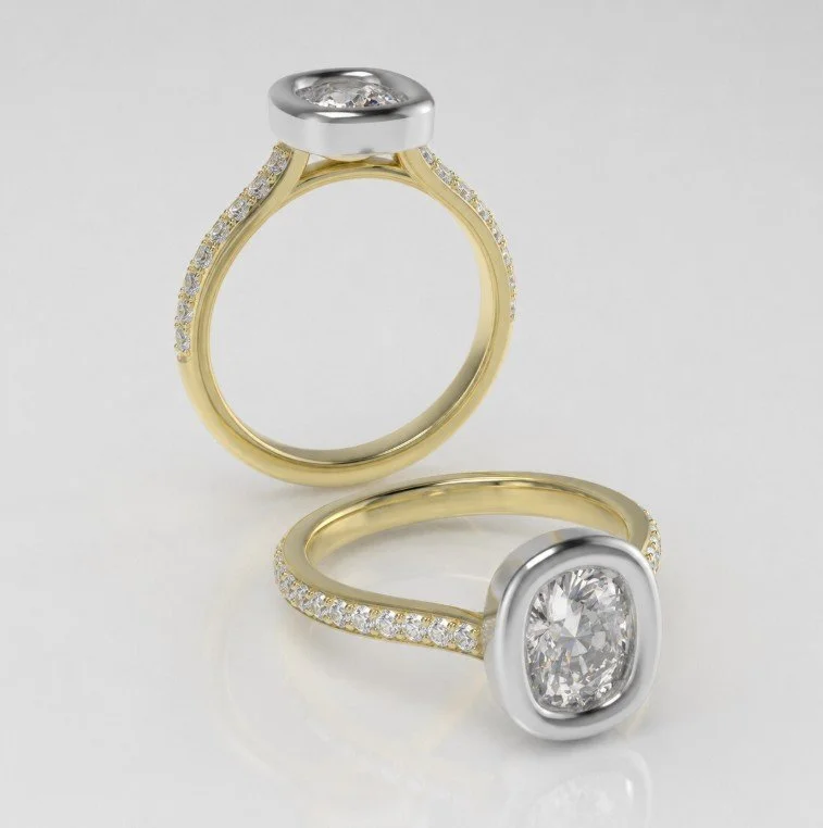 Two gold and platinum engagement rings with large central diamonds and smaller diamonds along the bands on a white background.
