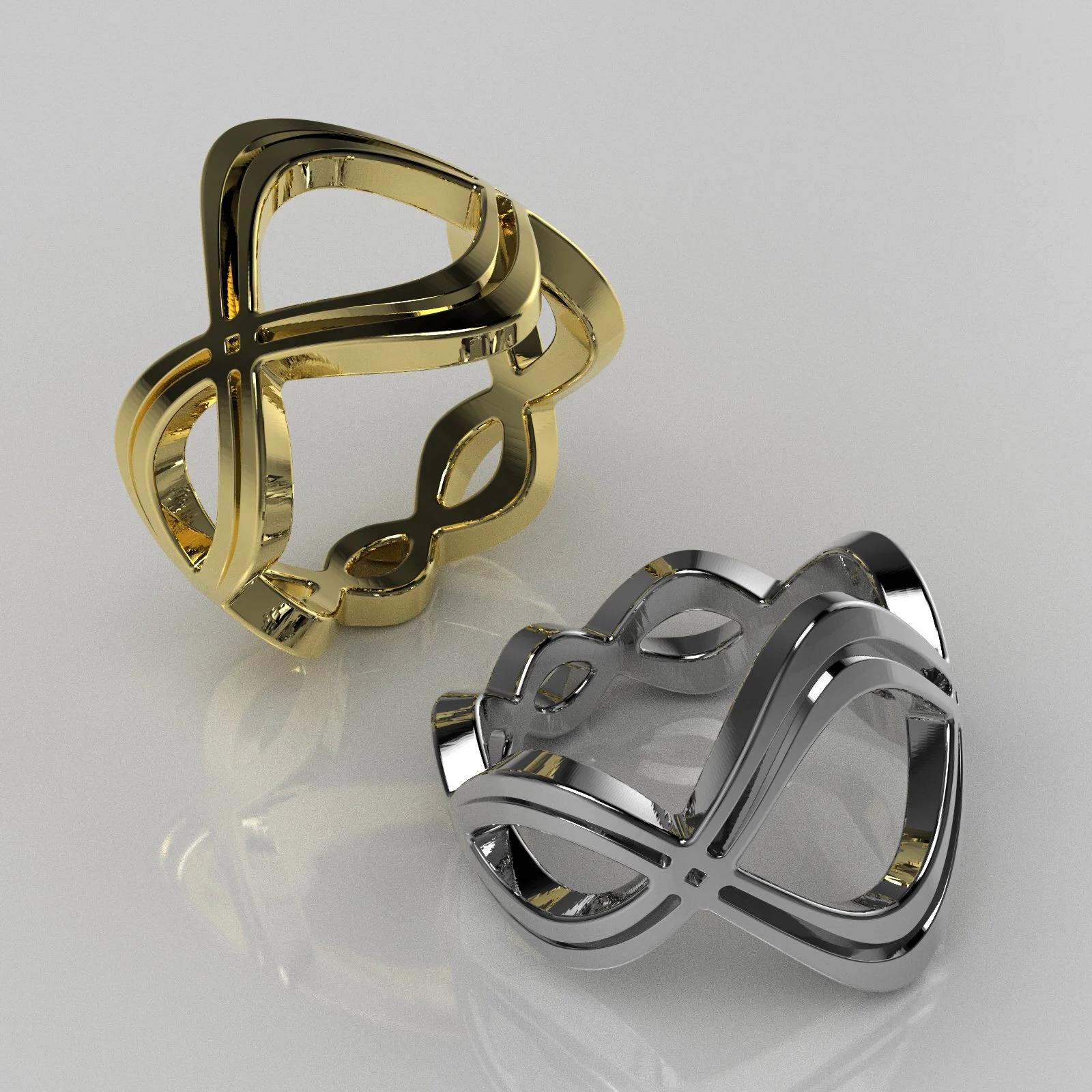 Gold and silver 3D object shaped like a stylized bird or leaf, reflecting light, placed on a smooth surface.