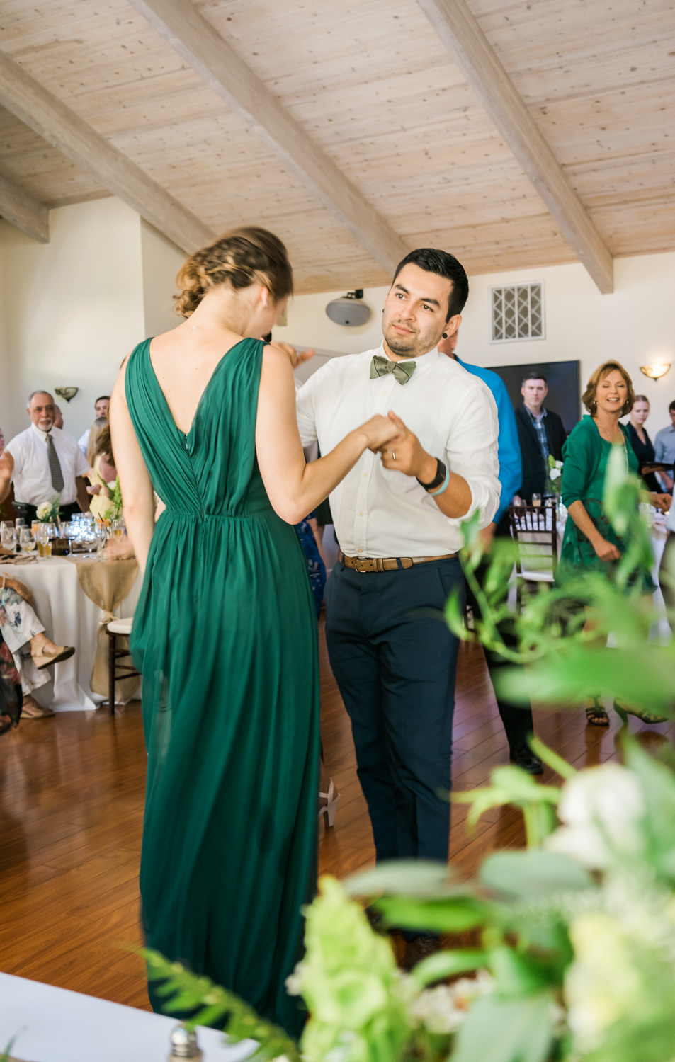 Bridesmaid and groomsmen enjoying the wedding dance party.