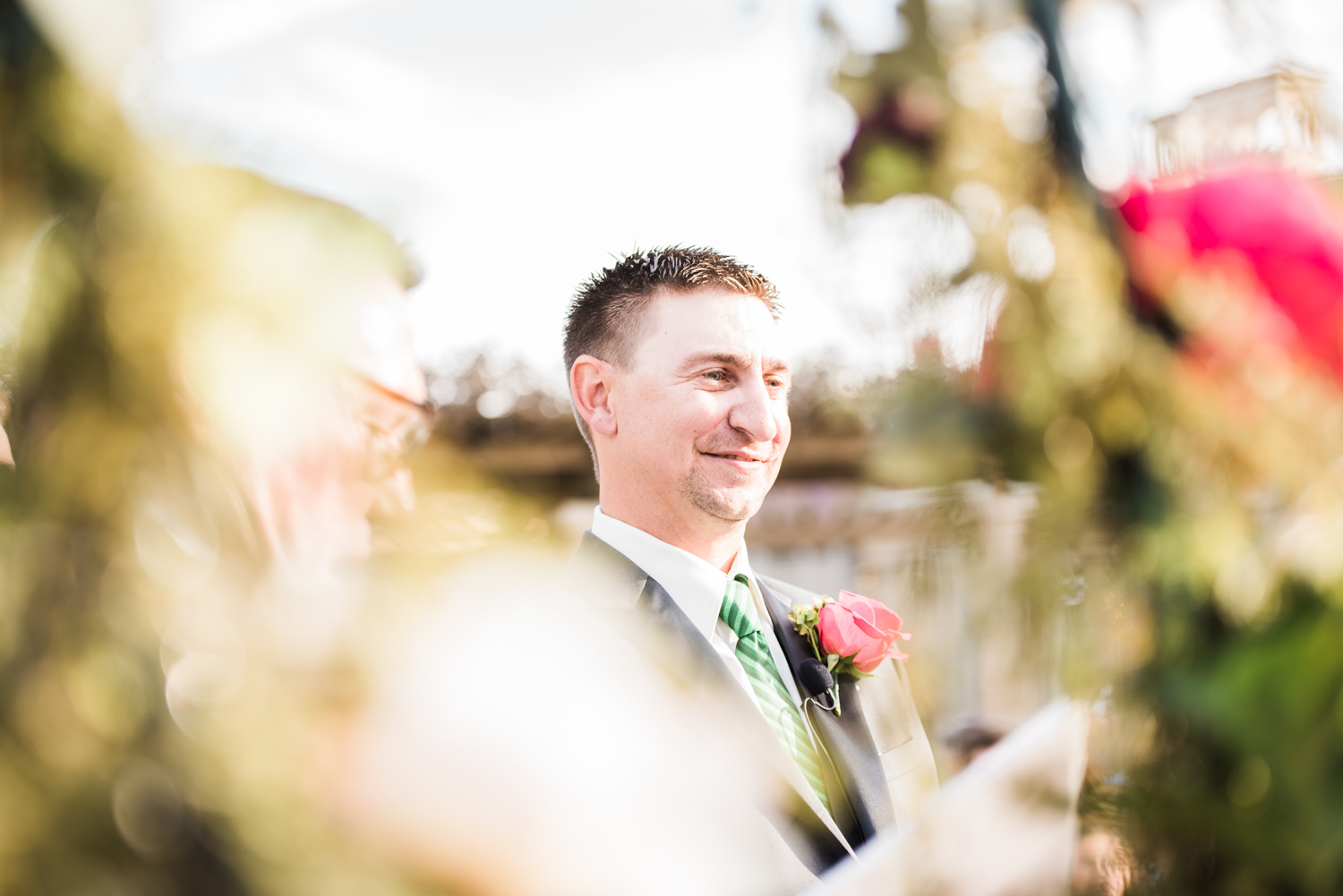 Groom admiring her bride.