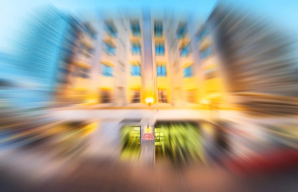 Hotel Fusion zoom burst shot - An interesting look to create focus on the sign board.