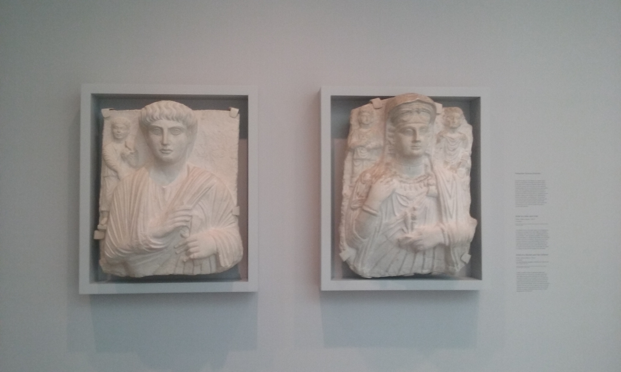 Relief of a Man and Child (1998.3) and Relief of a Woman and Two Children (1906.3) from Palmyra, c. 150 CE. (Fogg Museum, Harvard University)