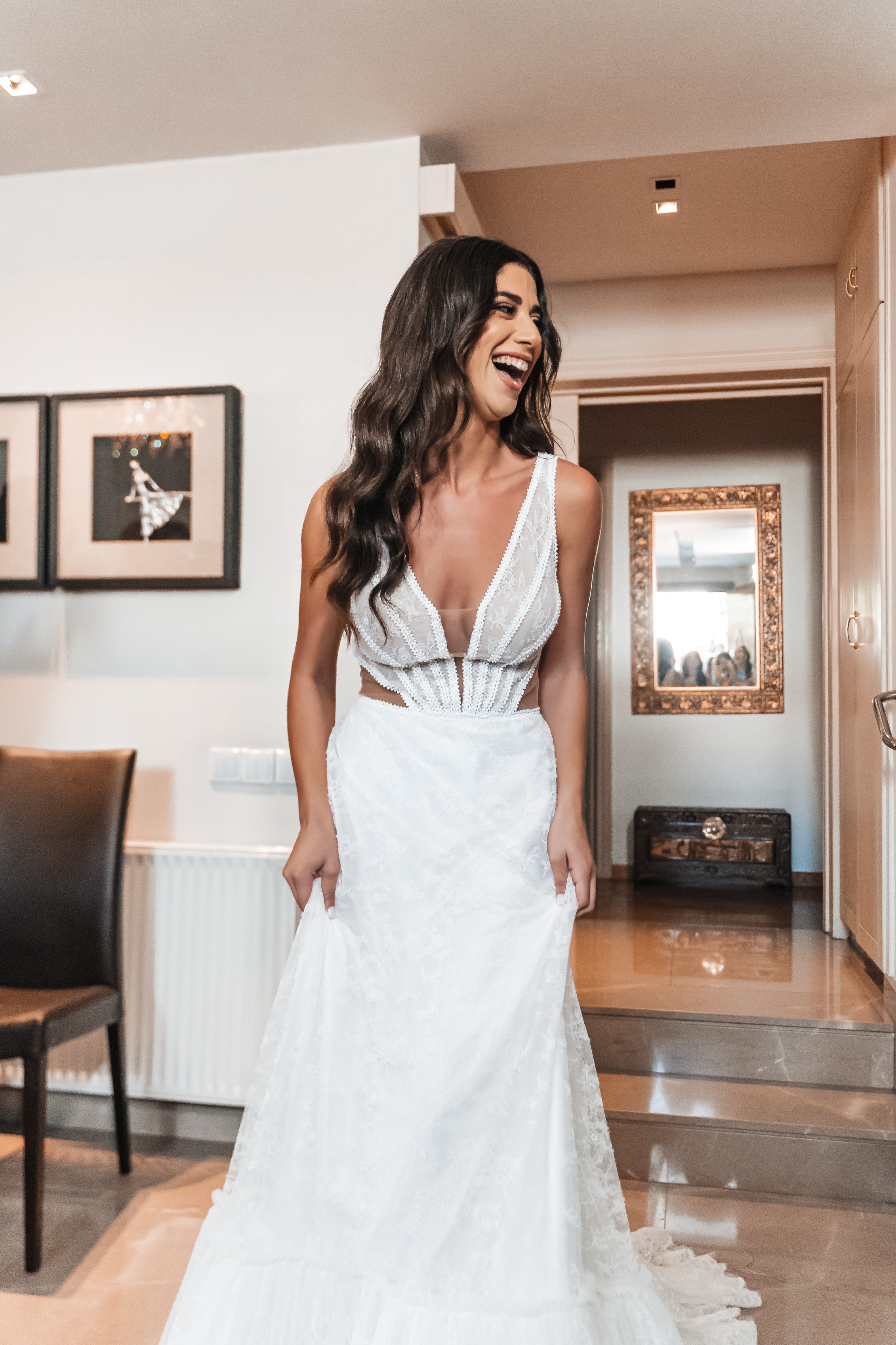 The bride's white gown flowed in the breeze as she made her way down the aisle, her groom waiting at the altar with tears in his eyes. Our wedding photographer in Limasol, Paphos, and Ayia Napa captur