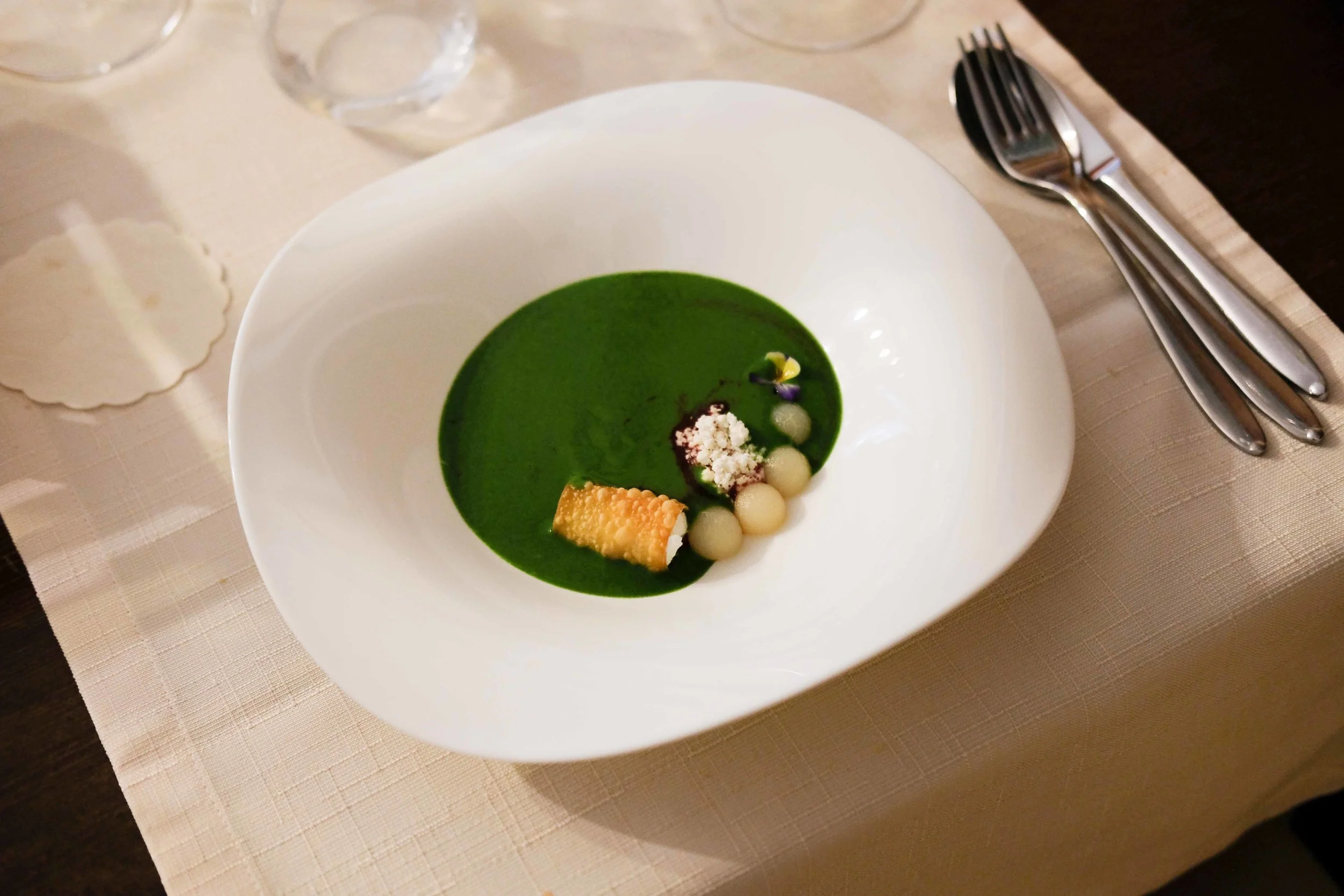 Grass green Nettle soup before and after. The soup was poured over the pear balls deep fried wonton wafer filled with ricotta cheese, pureed beet with plop of mild goats cheese.