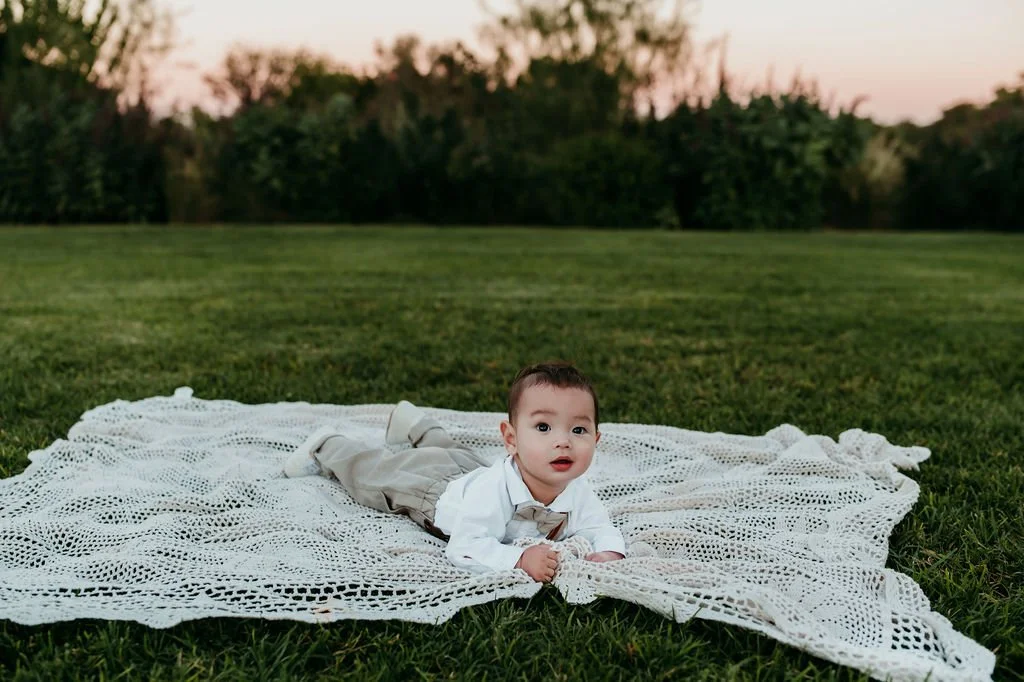 Baby laying on blanket