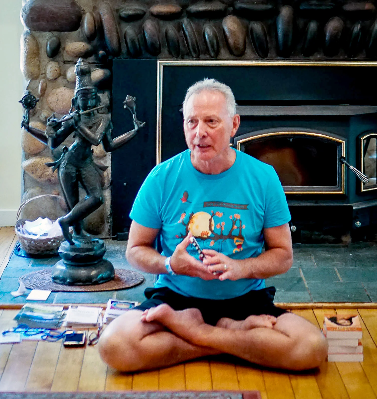 Roy Thibodeau, a longtime member of the Song of the Morning community, leads a meditation program in the Lodge during YogaFest 2017.