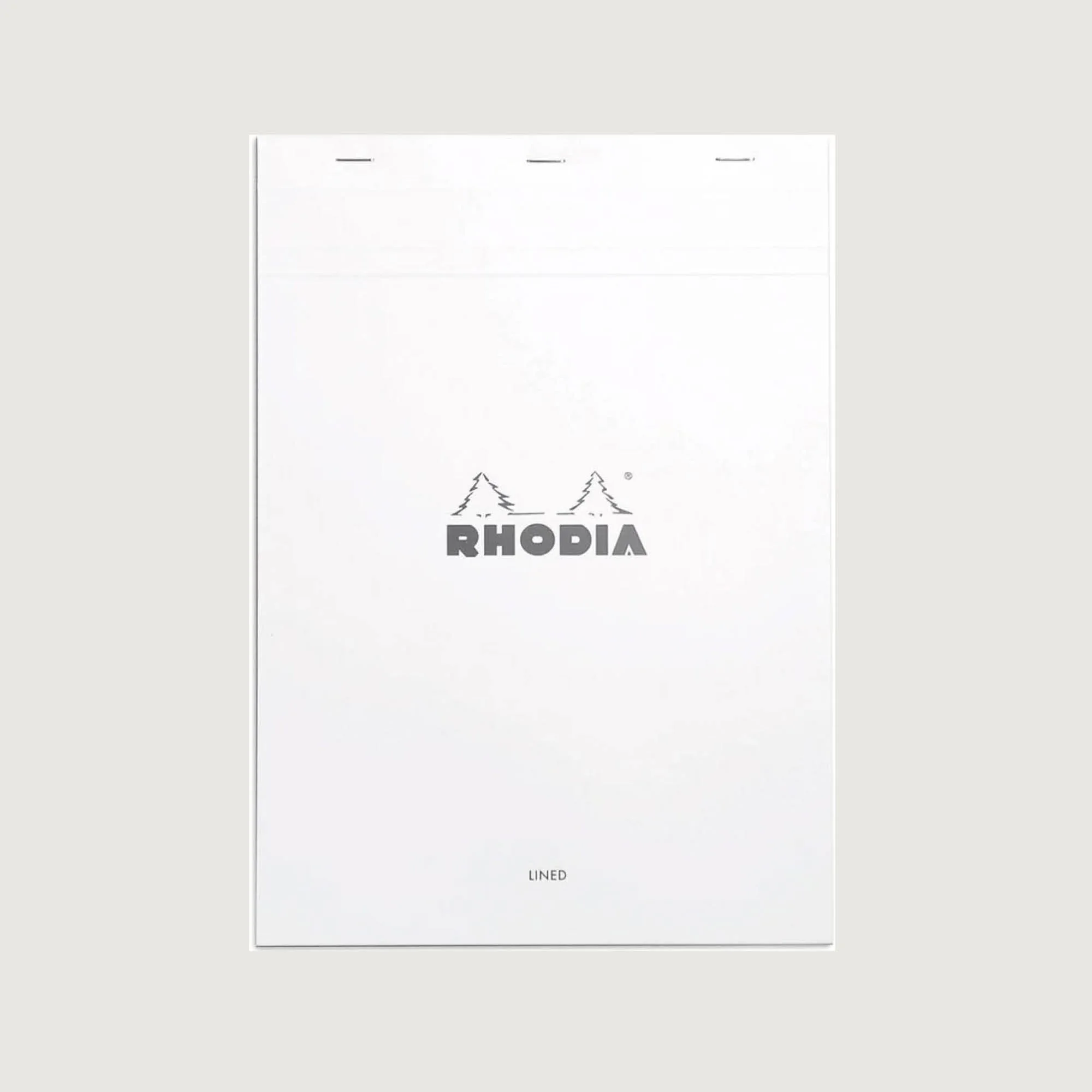 A white Rhodia lined notebook page with the brand name 'RHODIA' printed at the bottom and facing upward.