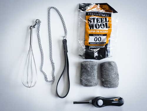 A $3.00 wire whisk, a $4.00 dog-leash, a lighter and some super fine grade steel wool- the type used in painting prep or polishing- you'll find it in the paint section at Mitre 10.